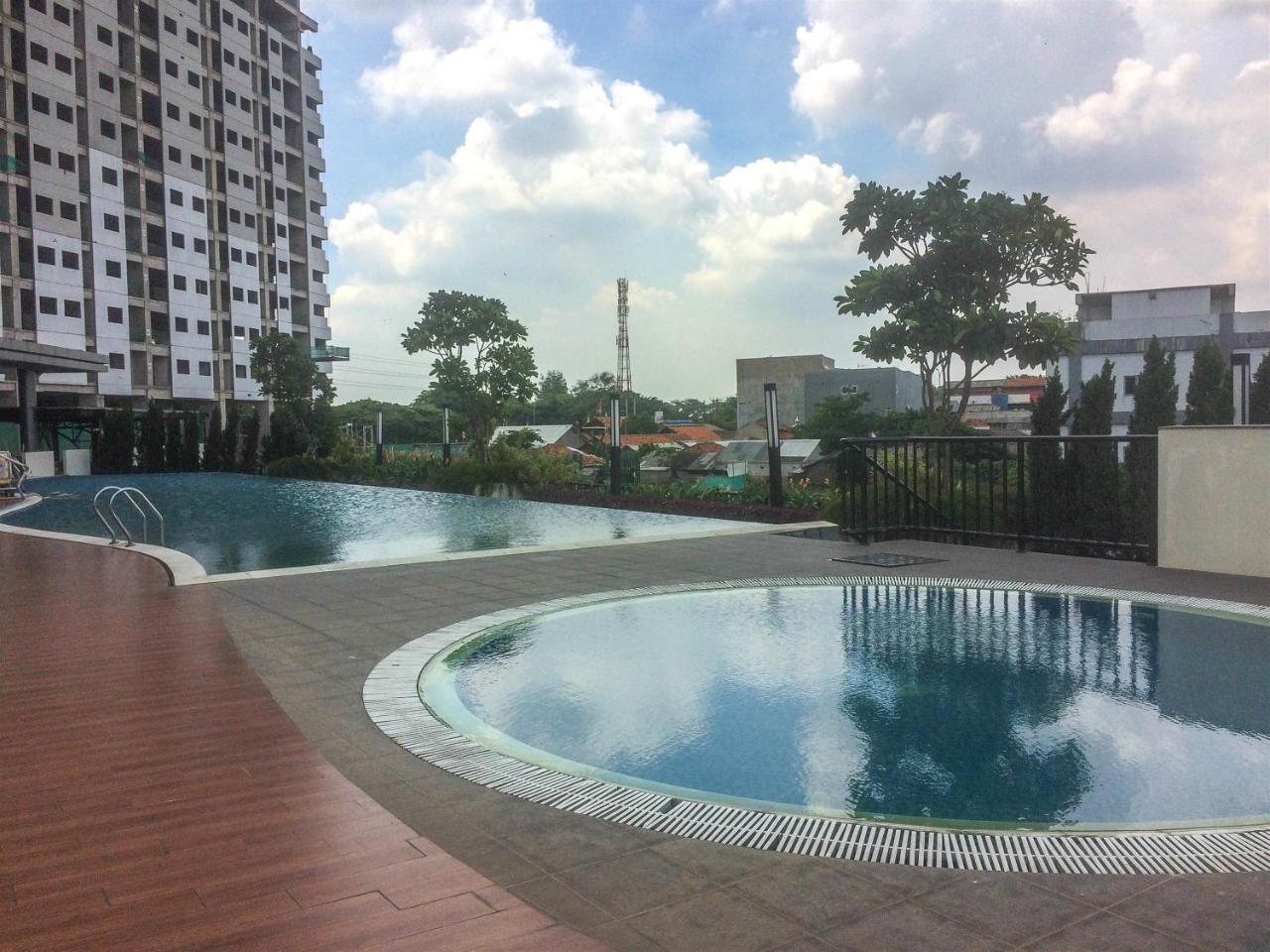 Apartemen Comfy The Oasis By Travelio